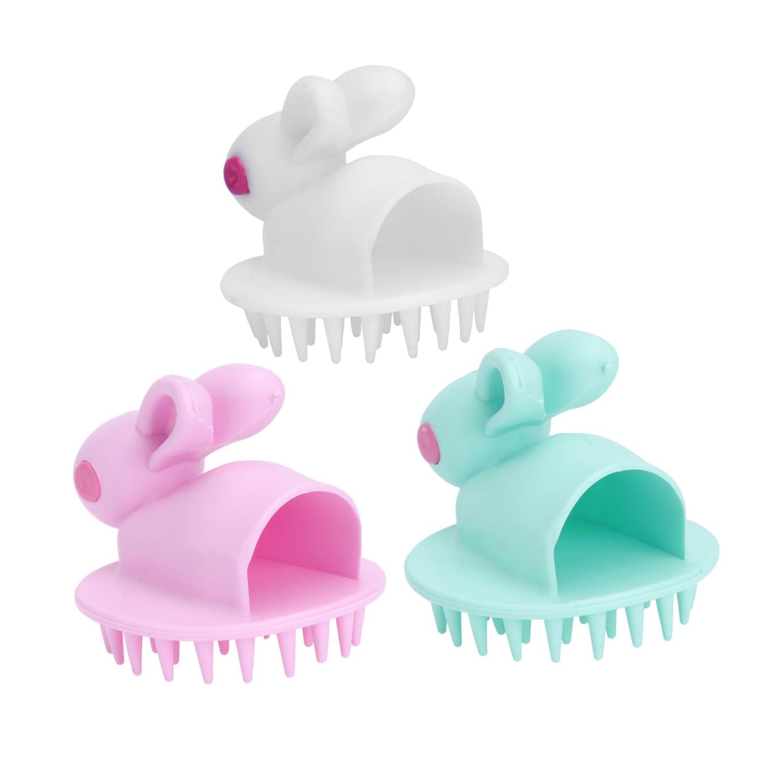 Three pet grooming tools with rabbit-shaped handles in white, pink, and green on a white background.